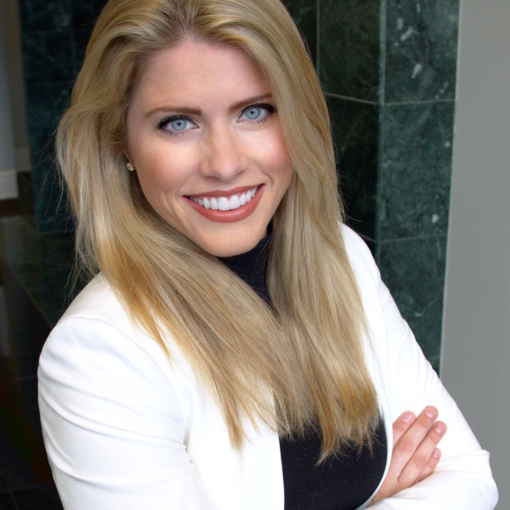 A woman striking a confident pose.